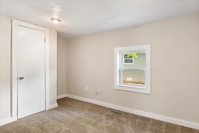 741 N Warren Ave, Springfield, MO 65802 - unfurnished bedroom featuring carpet and baseboards