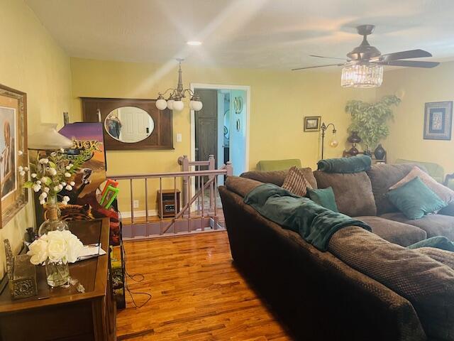 530 Taneycomo Hill Dr, Hollister, MO 65672 - living area featuring wood finished floors and ceiling fan