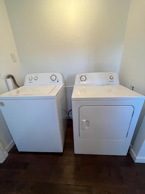 530 Taneycomo Hill Dr, Hollister, MO 65672 - laundry area with washing machine and clothes dryer and dark wood-style floors