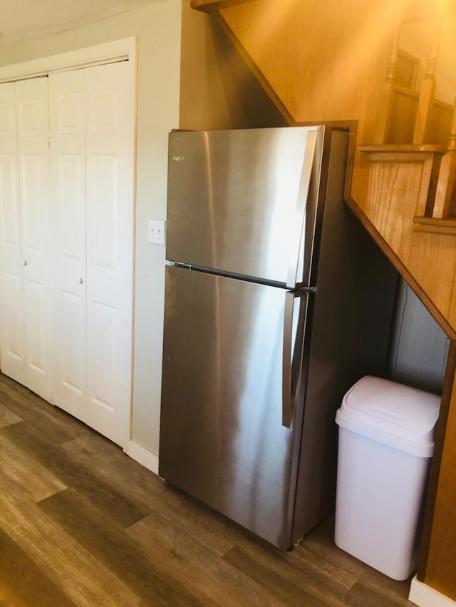 530 Taneycomo Hill Dr, Hollister, MO 65672 - kitchen with freestanding refrigerator and dark wood finished floors
