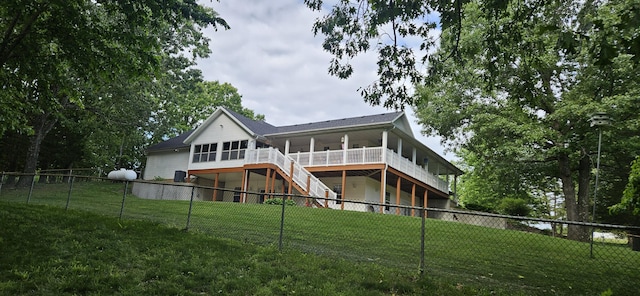 150 Licaria Rd, Ozark, MO 65721 - back of property featuring stairs, a wooden deck, and a sunroom