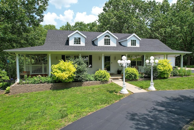 150 Licaria Rd, Ozark, MO 65721 - view of front of home featuring a porch, a front yard, and a shingled roof