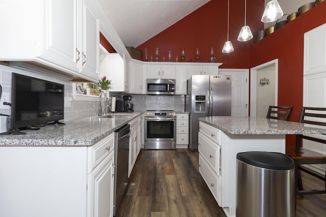 150 Licaria Rd, Ozark, MO 65721 - kitchen featuring appliances with stainless steel finishes, backsplash, dark wood-type flooring, white cabinets, and high vaulted ceiling