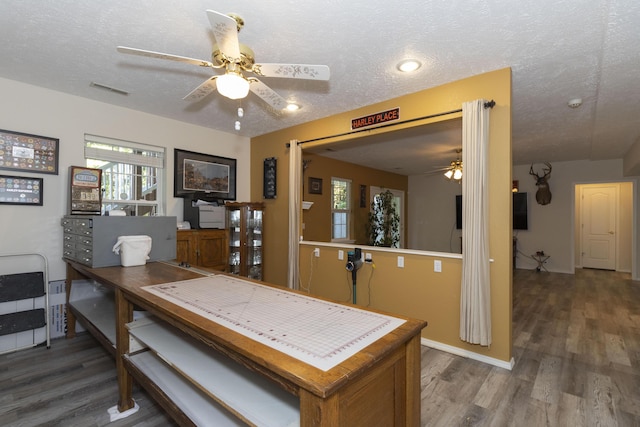 150 Licaria Rd, Ozark, MO 65721 - dining area with ceiling fan, wood finished floors, and a textured ceiling