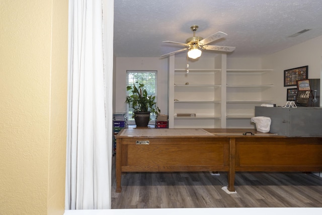 150 Licaria Rd, Ozark, MO 65721 - office featuring wood finished floors, ceiling fan, and a textured ceiling