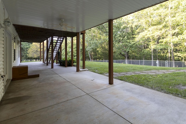 150 Licaria Rd, Ozark, MO 65721 - view of patio featuring ceiling fan and stairs