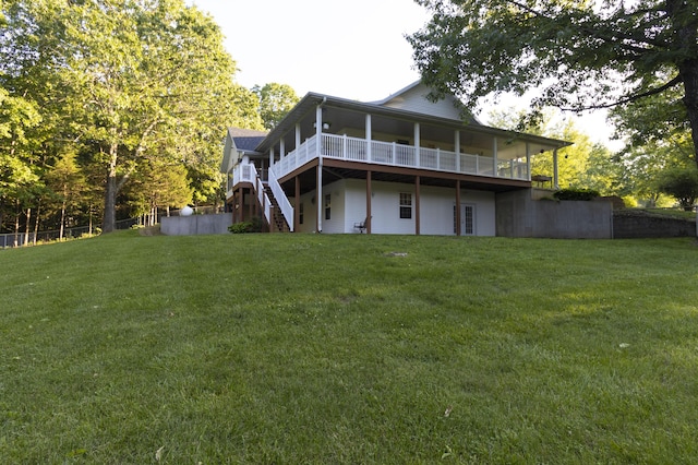 150 Licaria Rd, Ozark, MO 65721 - back of property featuring a lawn, a deck, and stairway