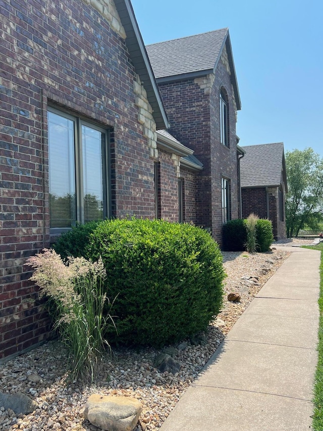 110 Castlekeep Dr, Rogersville, MO 65742 - view of side of home with brick siding and a shingled roof