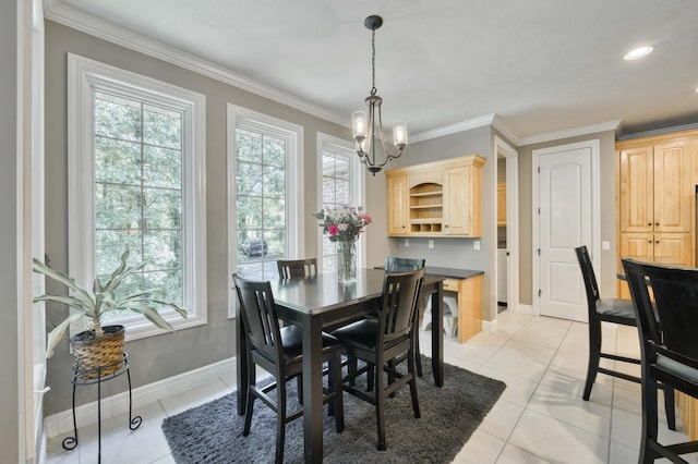 3262 S Thornridge Dr, Springfield, MO 65809 - dining space featuring plenty of natural light, a chandelier, baseboards, ornamental molding, and light tile patterned floors