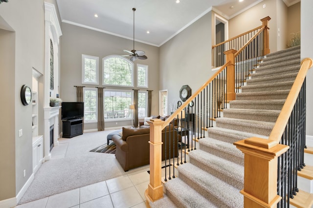 3262 S Thornridge Dr, Springfield, MO 65809 - staircase with ceiling fan, ornamental molding, tile patterned floors, a towering ceiling, and recessed lighting