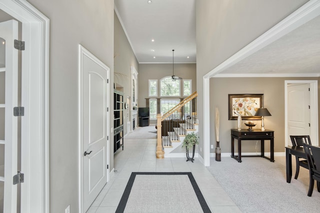 3262 S Thornridge Dr, Springfield, MO 65809 - entrance foyer with light tile patterned floors, baseboards, stairway, recessed lighting, and light colored carpet