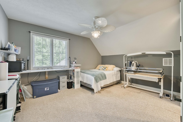 3262 S Thornridge Dr, Springfield, MO 65809 - carpeted bedroom featuring a ceiling fan, vaulted ceiling, and a desk