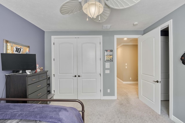 3262 S Thornridge Dr, Springfield, MO 65809 - bedroom featuring carpet floors, a closet, baseboards, and a ceiling fan