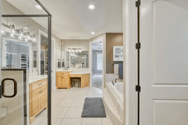 3262 S Thornridge Dr, Springfield, MO 65809 - full bathroom featuring vanity, a bath, tile patterned floors, a shower stall, and recessed lighting