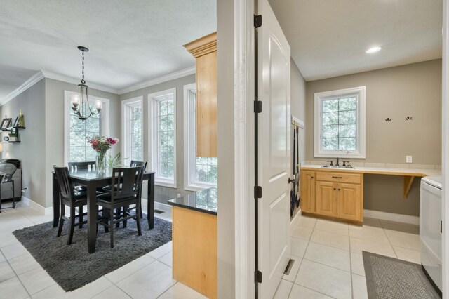 3262 S Thornridge Dr, Springfield, MO 65809 - dining area featuring healthy amount of natural light, crown molding, light tile patterned floors, a chandelier, and recessed lighting