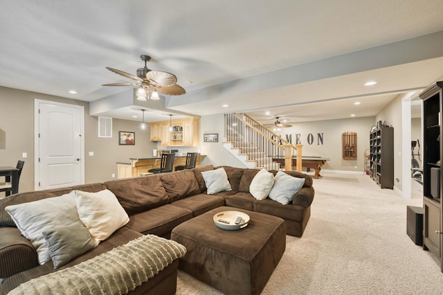 3262 S Thornridge Dr, Springfield, MO 65809 - living room featuring bar with sink, ceiling fan, stairs, light carpet, and recessed lighting