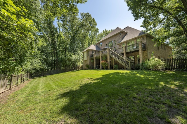 3262 S Thornridge Dr, Springfield, MO 65809 - view of yard featuring stairway and a wooden deck