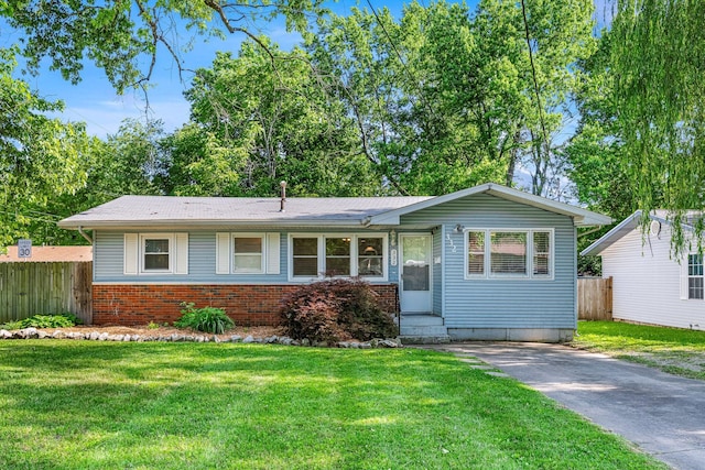 332 E Silsby St, Springfield, MO 65807 - view of front facade featuring brick siding