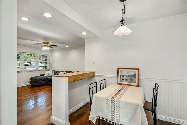 332 E Silsby St, Springfield, MO 65807 - dining room with crown molding, a ceiling fan, dark wood-type flooring, baseboards, and recessed lighting