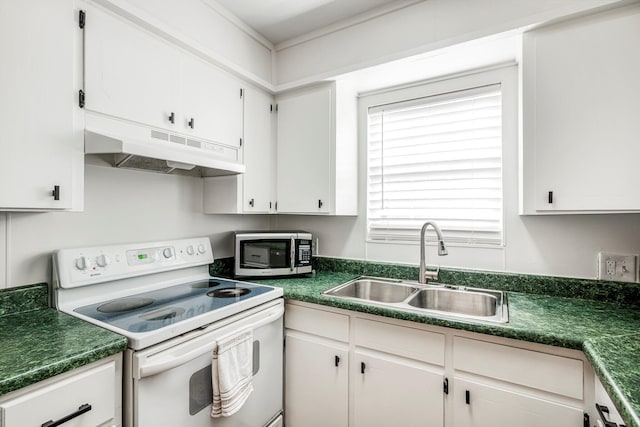 332 E Silsby St, Springfield, MO 65807 - kitchen with white electric range, under cabinet range hood, stainless steel microwave, a sink, and dark countertops