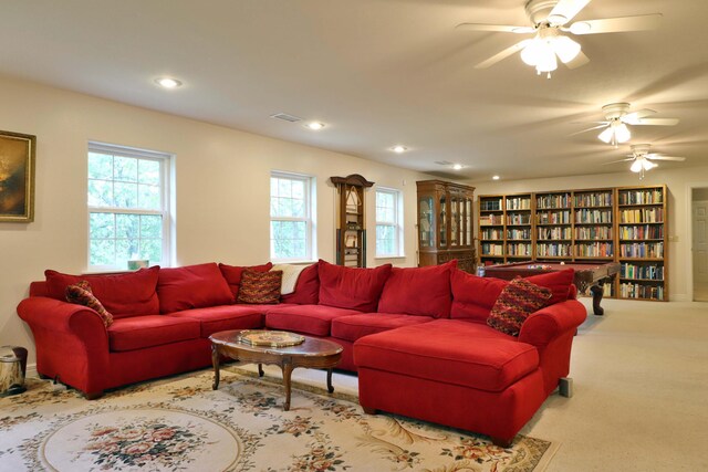 607 Sumac Ln, Marshfield, MO 65706 - carpeted living room featuring healthy amount of natural light, a ceiling fan, and recessed lighting