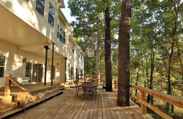 607 Sumac Ln, Marshfield, MO 65706 - wooden deck with outdoor dining area