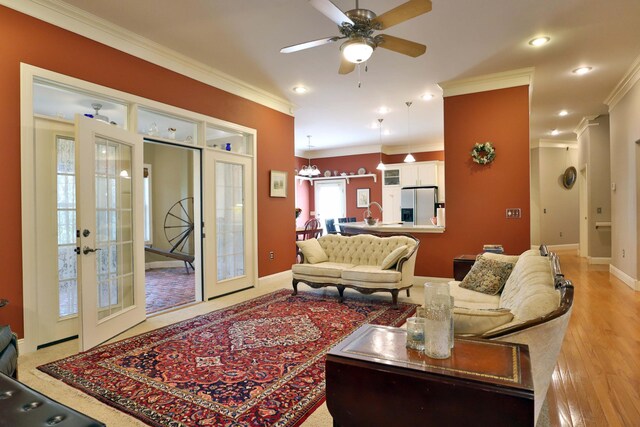 607 Sumac Ln, Marshfield, MO 65706 - living area featuring ornamental molding, french doors, baseboards, ceiling fan, and light wood-type flooring