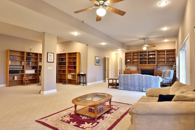 607 Sumac Ln, Marshfield, MO 65706 - living room featuring a ceiling fan, a fireplace, baseboards, carpet flooring, and recessed lighting