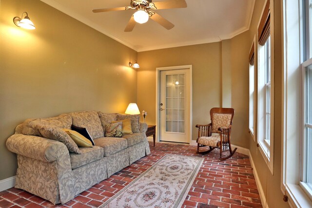 607 Sumac Ln, Marshfield, MO 65706 - living area featuring brick flooring, baseboards, crown molding, and a ceiling fan
