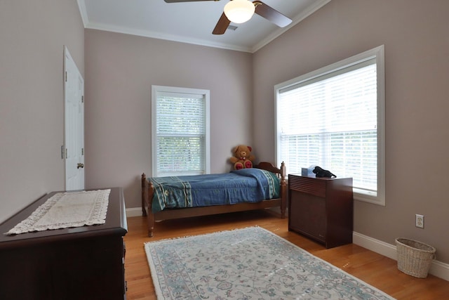 607 Sumac Ln, Marshfield, MO 65706 - bedroom featuring ornamental molding, light wood finished floors, baseboards, and a ceiling fan