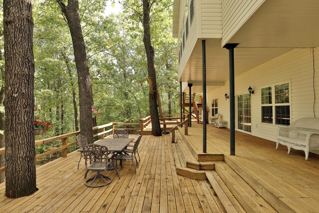 607 Sumac Ln, Marshfield, MO 65706 - wooden terrace featuring outdoor dining area and stairway