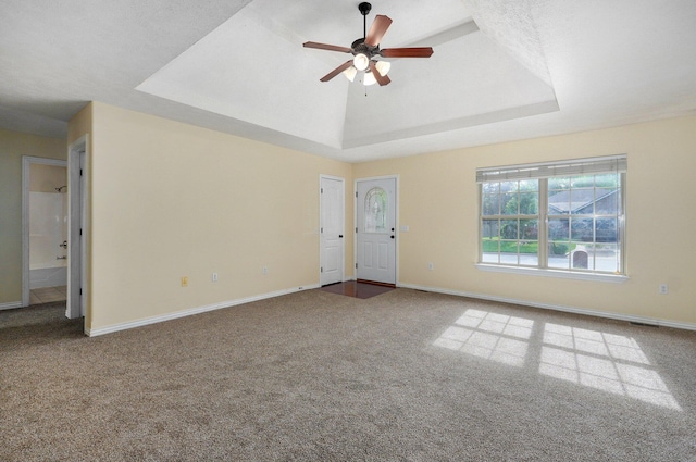 259 Aven Ave, Sparta, MO 65753 - unfurnished room featuring a tray ceiling, carpet, and a ceiling fan