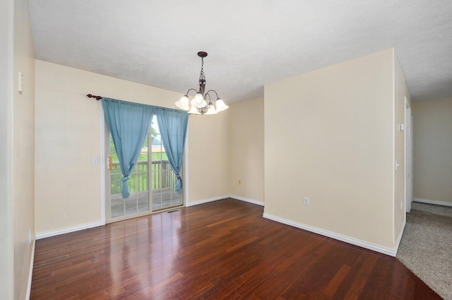259 Aven Ave, Sparta, MO 65753 - unfurnished room featuring a chandelier and wood finished floors