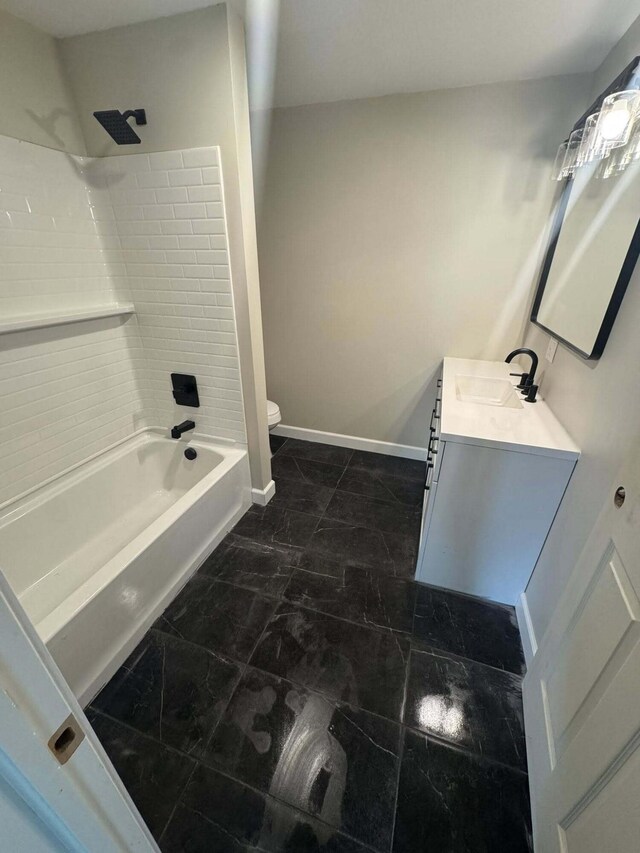 8574 County Road 6890, West Plains, MO 65775 - full bathroom with toilet, vanity, washtub / shower combination, and baseboards