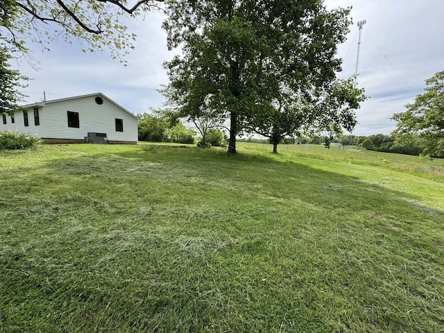 8574 County Road 6890, West Plains, MO 65775 - view of green lawn featuring cooling unit