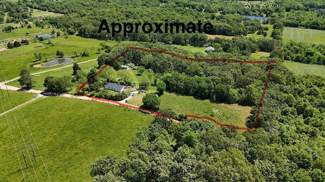 8574 County Road 6890, West Plains, MO 65775 - overview of rural landscape with property boundaries highlighted and a heavily wooded area