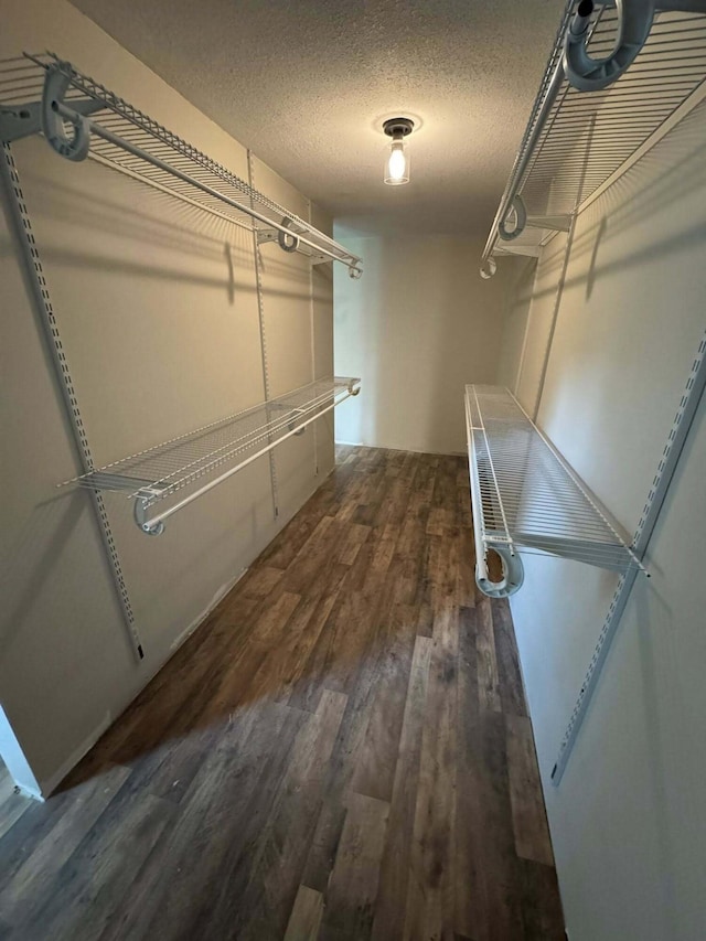 8574 County Road 6890, West Plains, MO 65775 - walk in closet with wood finished floors