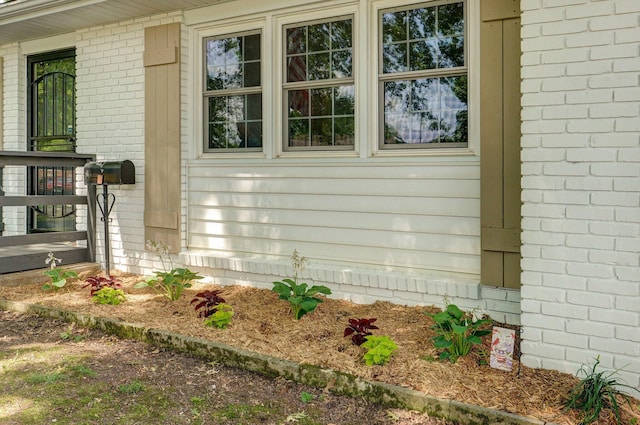 2411 S Rogers Ave, Springfield, MO 65804 - view of side of property featuring brick siding