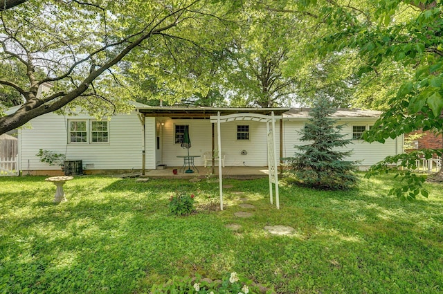 2411 S Rogers Ave, Springfield, MO 65804 - rear view of property with a patio and cooling unit