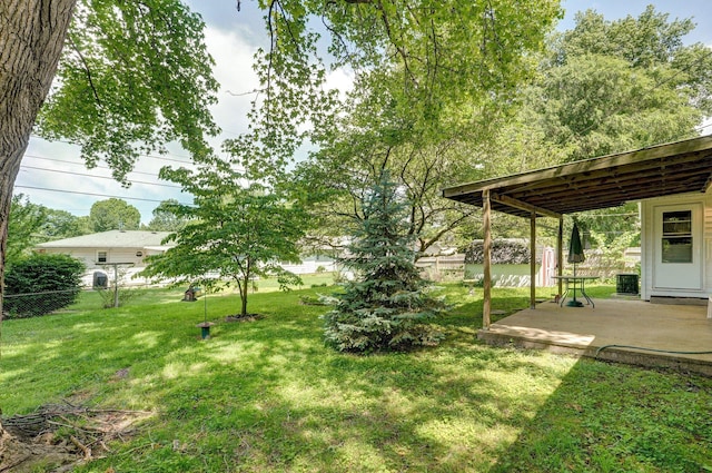2411 S Rogers Ave, Springfield, MO 65804 - view of yard with a patio area