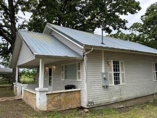 21461 Needles Eye Rd, Shell Knob, MO 65747 - back of house with metal roof and covered porch