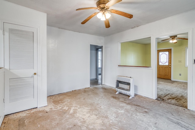 21461 Needles Eye Rd, Shell Knob, MO 65747 - unfurnished living room featuring heating unit, a ceiling fan, and baseboards