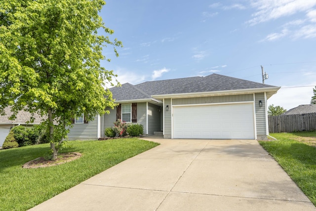 317 Cinnamon Ct, Sparta, MO 65753 - ranch-style home featuring an attached garage, concrete driveway, and a shingled roof
