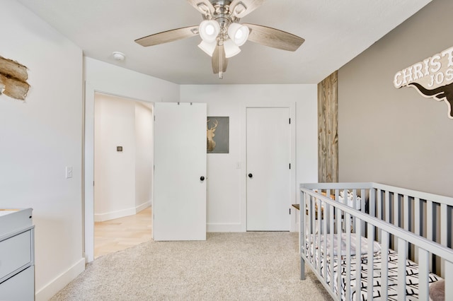 317 Cinnamon Ct, Sparta, MO 65753 - carpeted bedroom featuring ceiling fan, a closet, and a crib