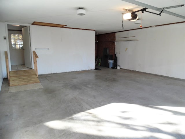 824 Highland Dr, Aurora, MO 65605 - garage with a garage door opener