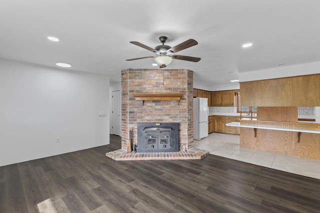 824 Highland Dr, Aurora, MO 65605 - unfurnished living room with a ceiling fan, light wood-style flooring, and recessed lighting