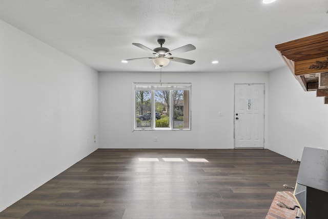 824 Highland Dr, Aurora, MO 65605 - unfurnished living room with ceiling fan, dark wood-style flooring, and recessed lighting