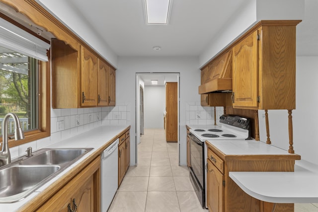 824 Highland Dr, Aurora, MO 65605 - kitchen with electric stove, dishwasher, a sink, decorative backsplash, and light tile patterned floors