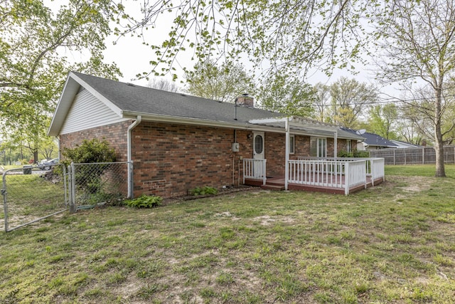 824 Highland Dr, Aurora, MO 65605 - back of property with brick siding, a wooden deck, a chimney, and a gate