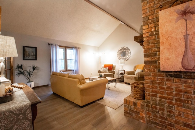 1831 E Woodbine St, Springfield, MO 65803 - living area with wood finished floors and lofted ceiling